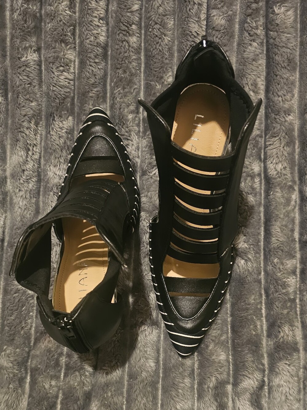 Black abd White Strappy Pointed Toe Heels with Contrast Strips.